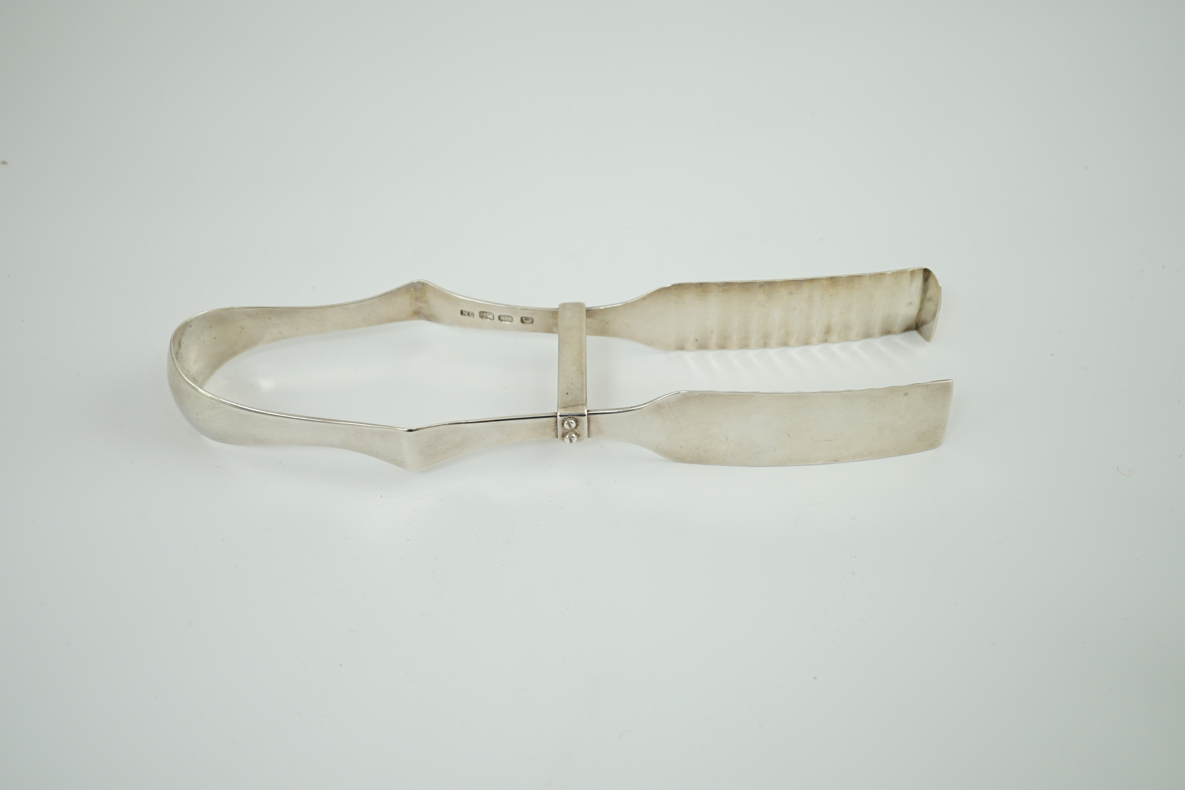 A pair of George III Irish silver bacon tongs, by Samuel Neville